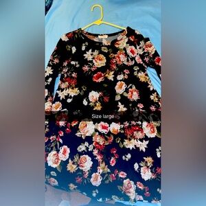 Long sleeve above the knee length dress.